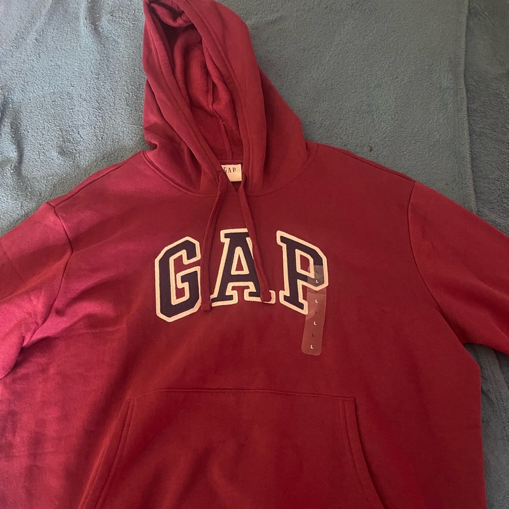 Unisex maroon/burgundy Hoodie.